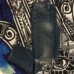 Distressed denim jeans